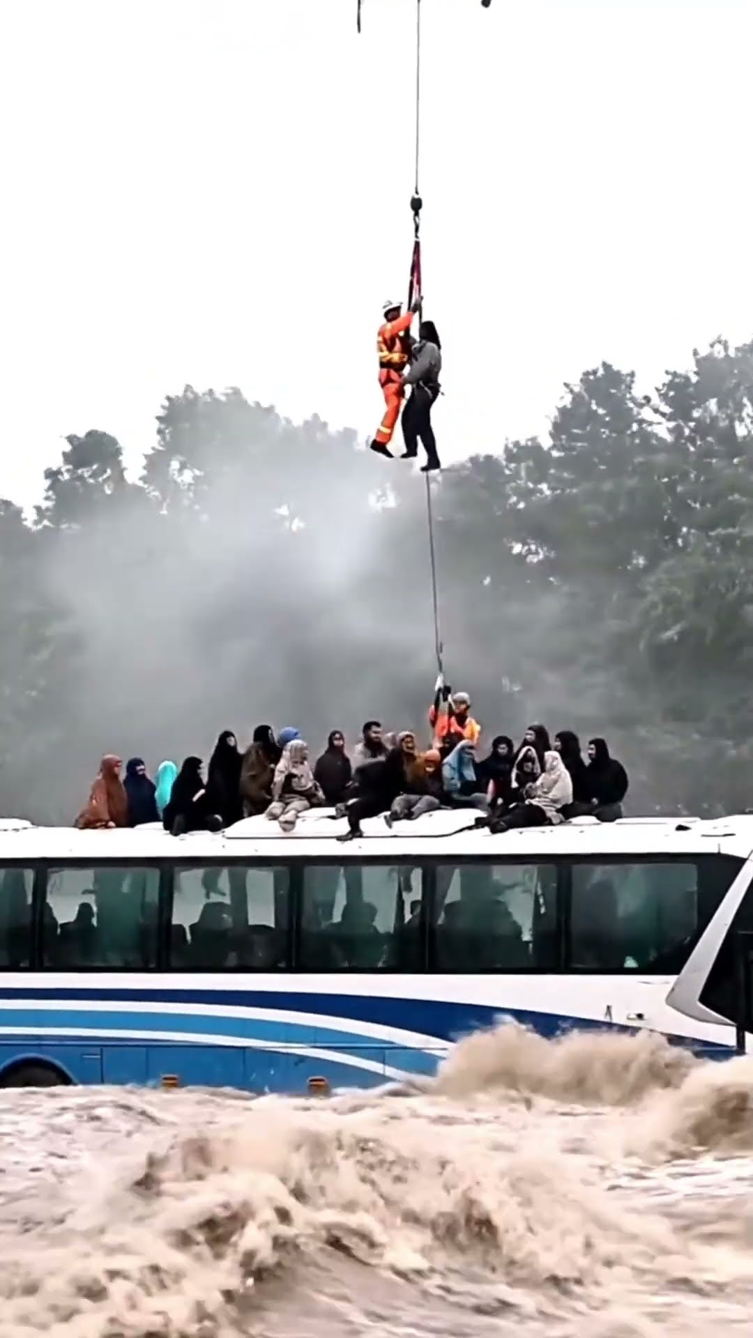 Helicopter Rescues Dozens From Submerged Bus in Deadly Floods #viral #shorts – YouTube